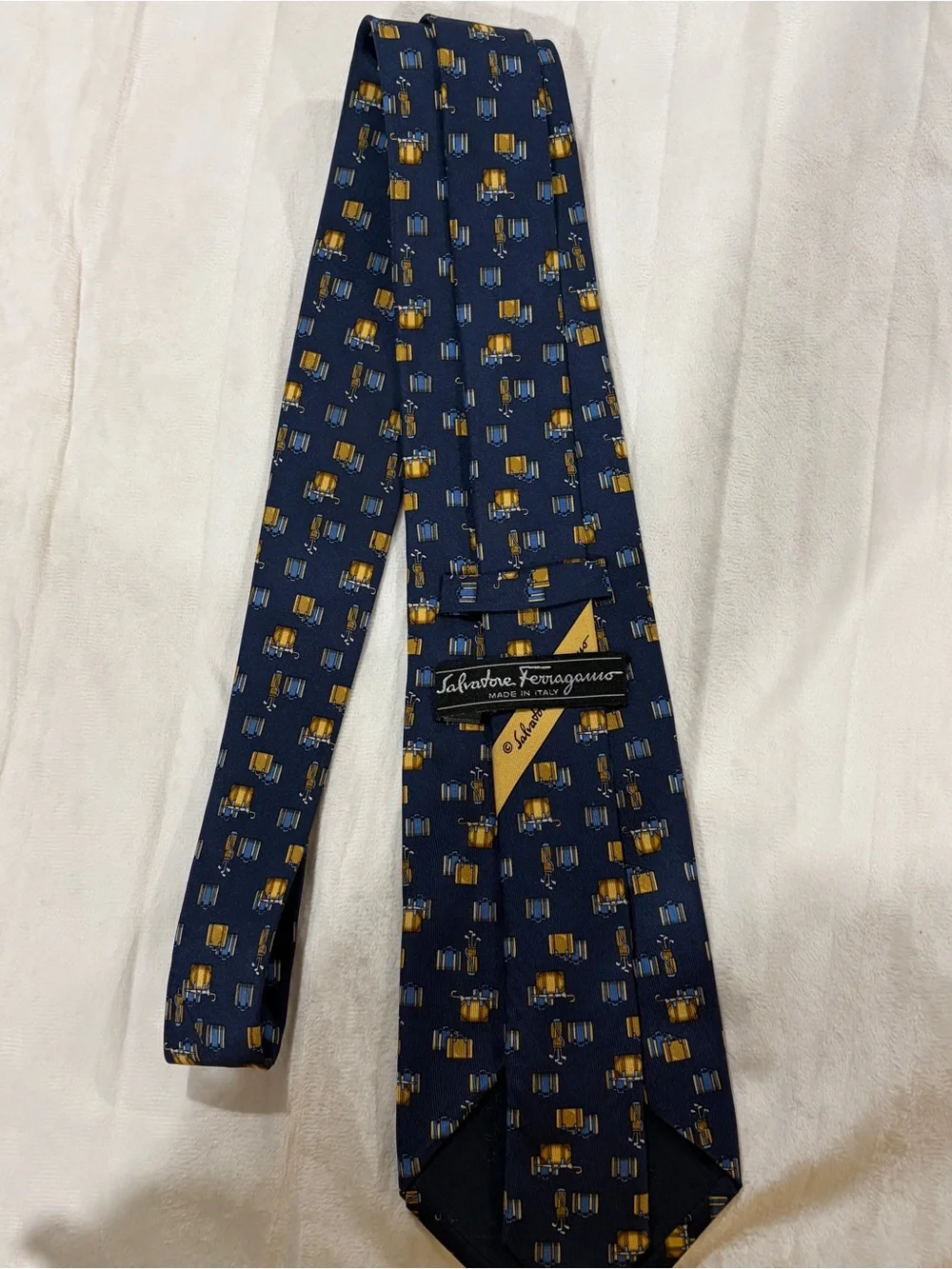 Salvatore Ferragamo Navy Blue Silk Tie with Yellow Accent Pattern